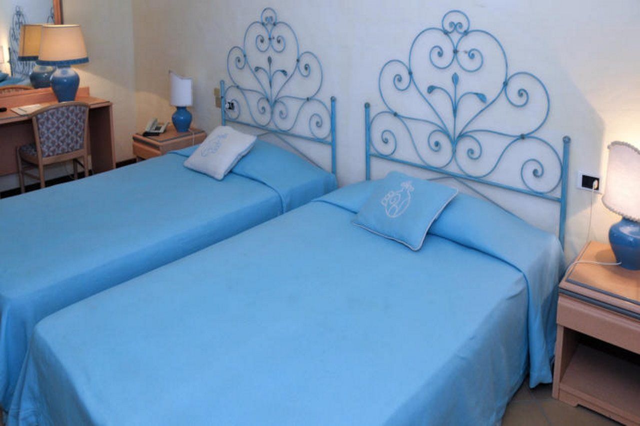 Hotel Pulicinu Baja Sardinia Kültér fotó