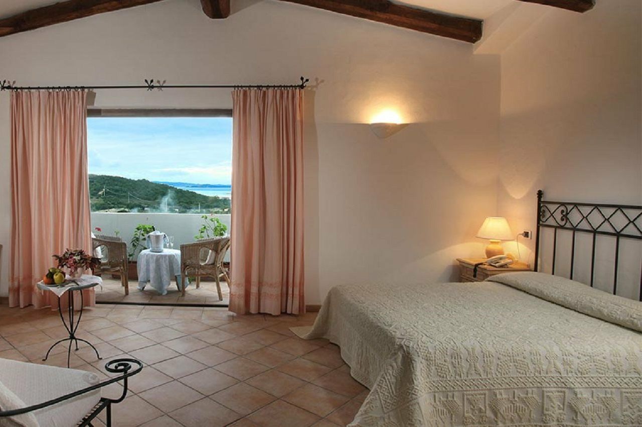 Hotel Pulicinu Baja Sardinia Kültér fotó